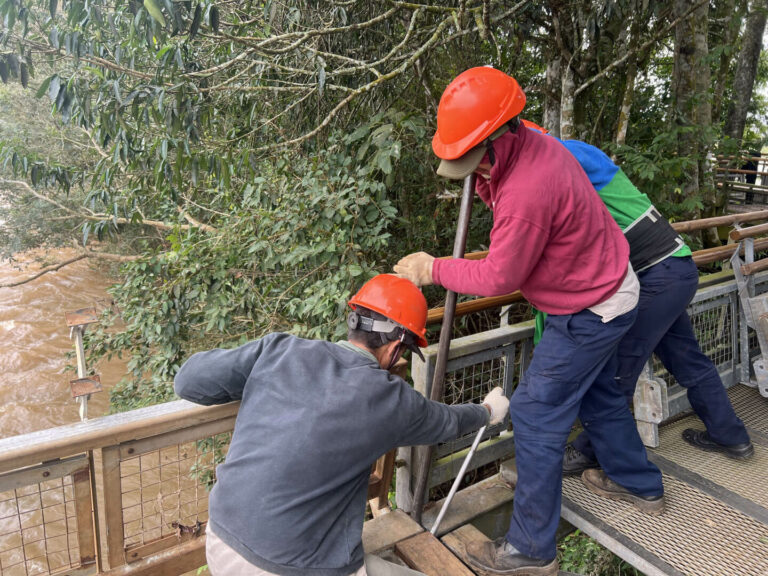 People working on the repair of the Devil's Throat circuit, Iguazu National Park, Argentina.